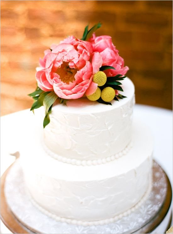 Wedding Cake floral topper - Simple cake, beaded seam, full flowers in a soft color on top.: 
