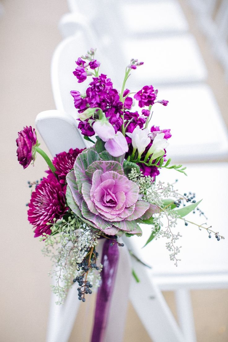 Purple cabbage floral chair decor | Photography: Sharon Nicole Photography - www.sharonnicolephotography.com Read More: http://www.stylemepretty.com/2014/05/23/modern-villa-antonia-wedding/: