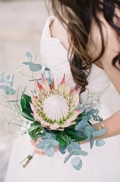 king protea wedding bouquet, photo by Feather and Stone http://ruffledblog.com/south-african-destination-elopement #flowers #kingprotea #weddingbouquet