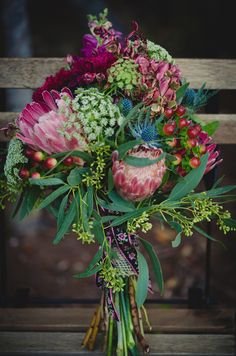Protea bridal bouquet | Just For Love Photography | see more on: http://burnettsboards.com/2014/08/intimate-wintry-garden-wedding/