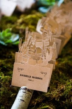 Winter place cards with antlers: http://www.stylemepretty.com/utah-weddings/park-city/2014/12/22/snowy-mountain-winter-wedding/ | Photography: Cory Ryan - http://www.coryryan.com/