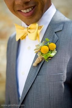 Andrew accented his yellow bow tie with a boutonniere featuring a succulent and yellow craspedia pods.