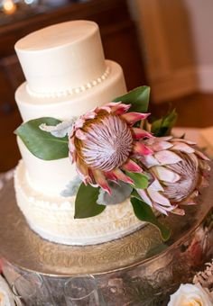 I love this ruffled bottom cake layer! Pharmacists' Peach Protea Cedarwood Wedding | Cedarwood Weddings #cedarwoodweddings