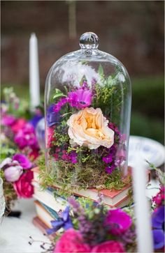 Bright and earthy wedding reception table decor. #weddingflorals #tabledecor #weddingchicks Event Design: Darcey May Events ---> http://www.weddingchicks.com/2014/05/01/alice-in-wonderland-wedding-ideas/