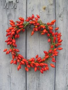 Rose hip wreath by The Blue Carrot, UK. Gardenista