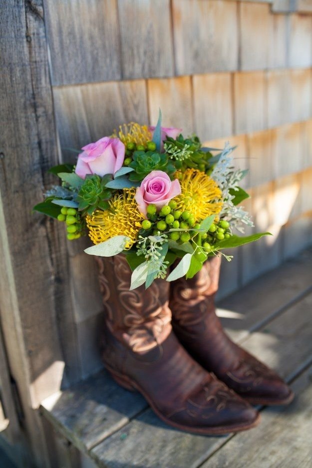 And use extra pairs of cowboy boots as decoration. | 24 Ways To Throw A Spectacular Country-Themed Wedding: 
