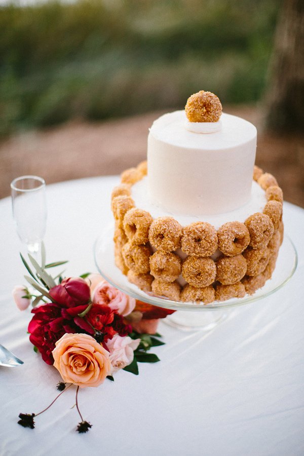 wedding cake with donuts - photo by Clay Austin Photography http://ruffledblog.com/southern-wedding-with-fashion-decor-elements