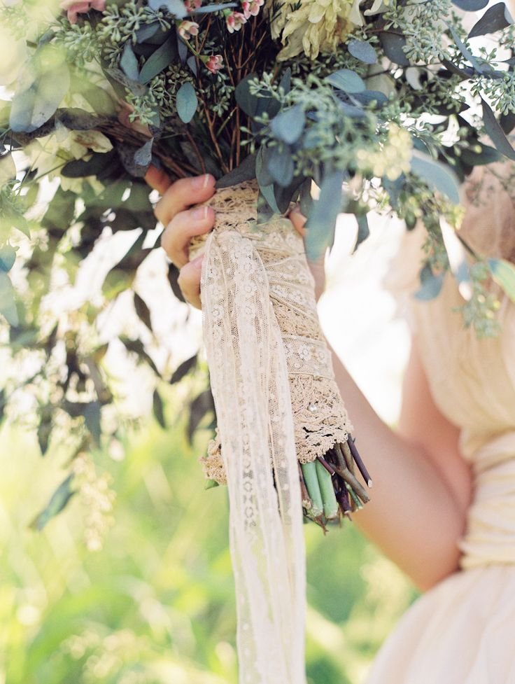 Vintage Lace Bouquet Wrap on http://www.StyleMePretty.com/2014/03/24/pink-maui-bridal-shoot/ Photography: Wendy Laurel - www.wendylaurel.com #SMP: