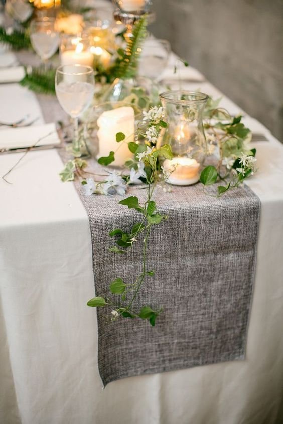 Nice example of greenery and candles along runner. Just add candelabra and no burlap: 
